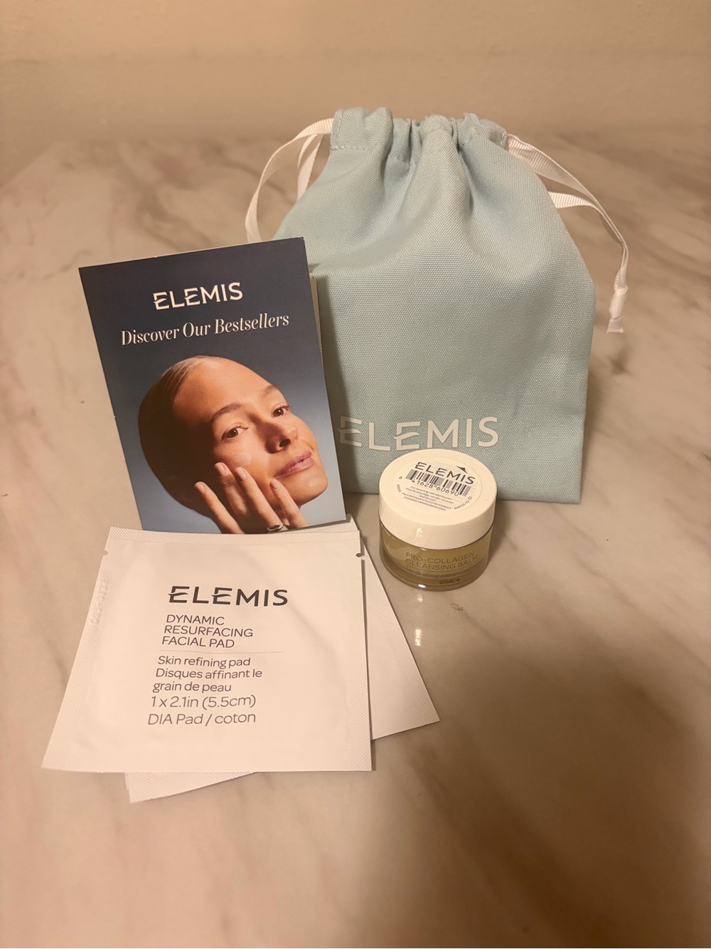ELEMIS Skincare Set with Light Blue Pouch and White Packaging